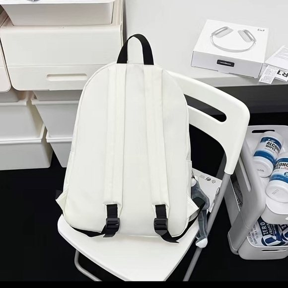 Black Book bag. Chic. Large capacity. Inspired by Bauhaus architecture .Backpack - Picture 5 of 9